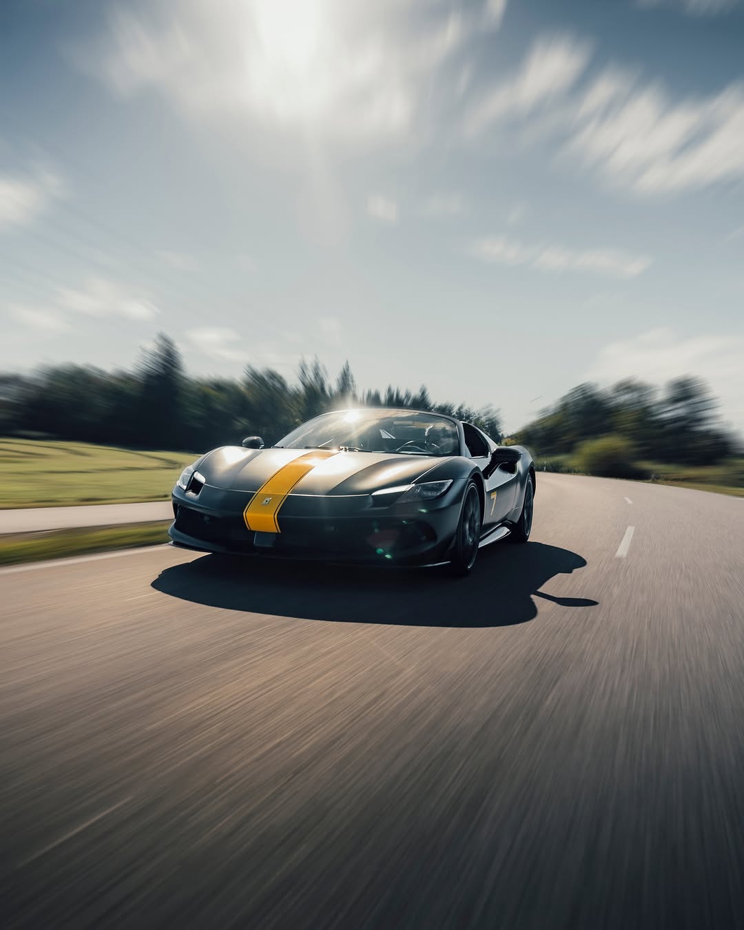 Matte black Ferrari 296 GTS rolling shot with CULT 7 livery